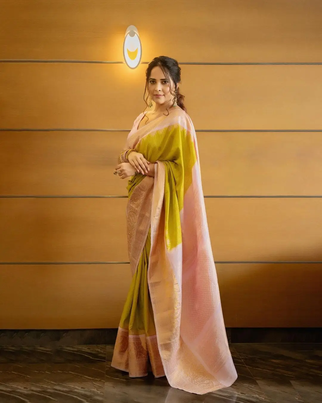 Anasuya Bharadwaj Wearing Beautiful Earrings Bangles Green Saree